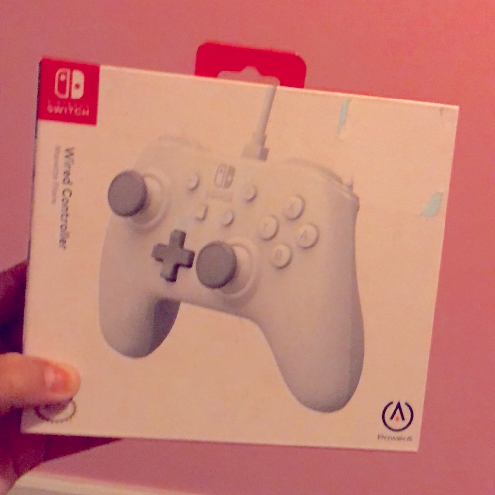 A white Nintendo controller